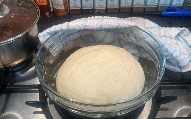 dough proving in a bowl