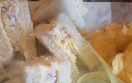 cheese and onion sandwich triangles and crisps