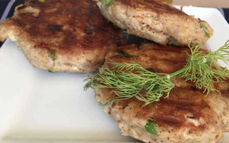 a tuna burger with dill