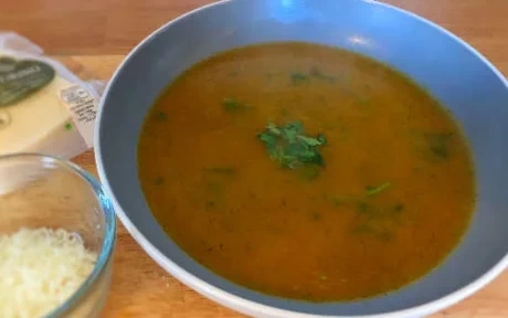 a bowl of spicy carrot and coriander soup