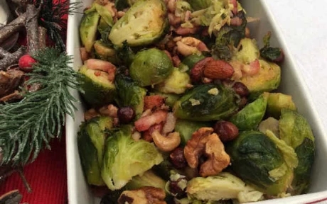 tray of roasted sprouts and mixed nuts