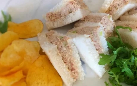 a plate of tuna sandwiches