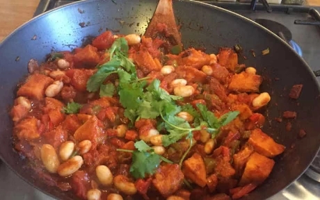 sweet potato and carrot chilli in a wok